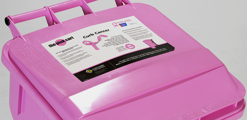 In-Mold Labeling Example on Pink Cart Lid - Cascade Cart Solutions